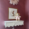 A Whimsical and Tender Nursery Nook: Shelf, Bear, and Bunny